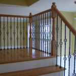 metal basket balusters with traditional profile newel post